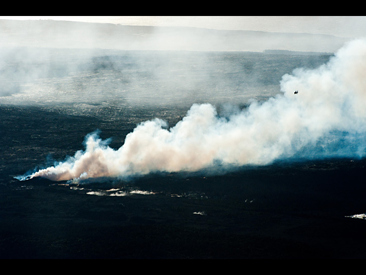 Helicopter in smoke from Kilauea eruption – Hawaii, USA – March 2011